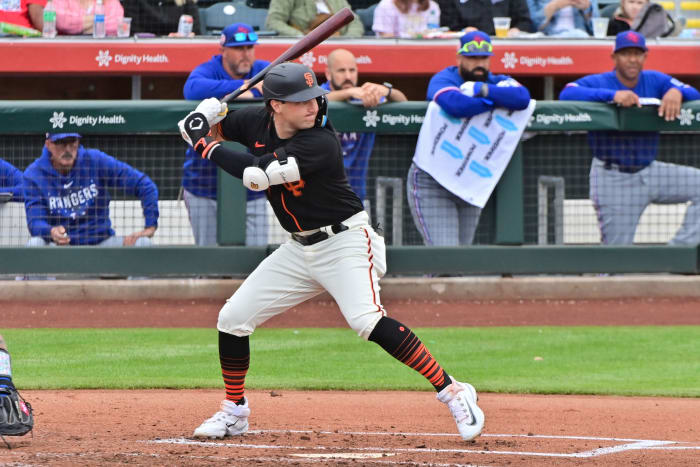 SF Giants DH Casey Schmitt at bat against the Texas Rangers during a Spring Training game. (2023)